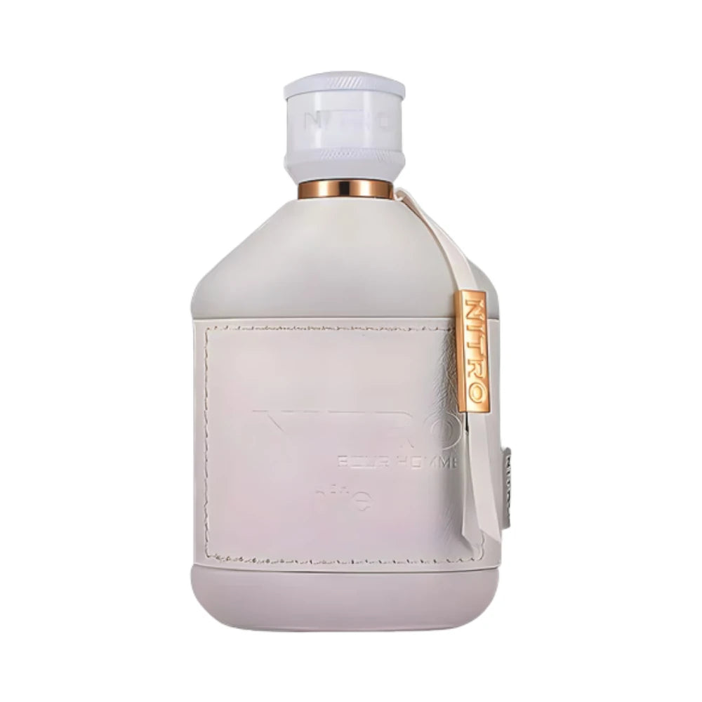 Nitro White Pour Homme de Dumont, fragancia de cuero con ciprés, mirra y vainilla. Cálida y elegante.