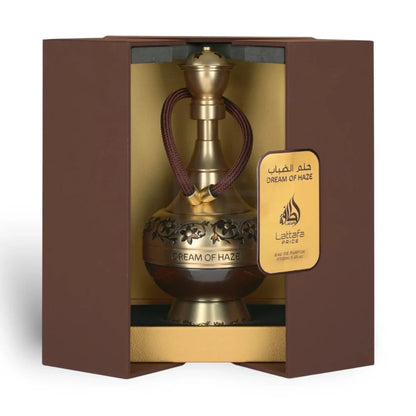 Dream of Haze de Lattafa Pride, fragancia ambarada fougère con menta, manzana, canela y haba tonka.