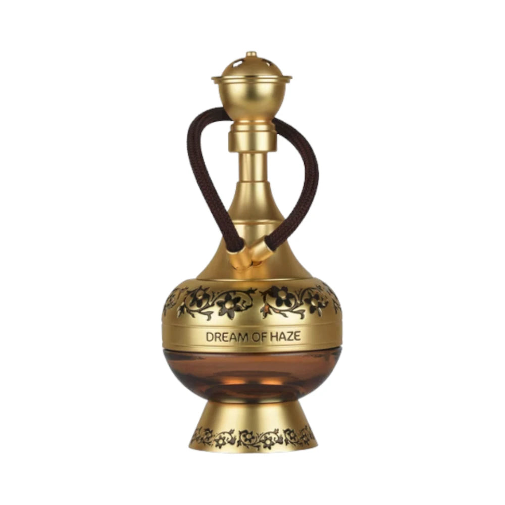 Dream of Haze de Lattafa Pride, fragancia ambarada fougère con menta, manzana, canela y haba tonka.