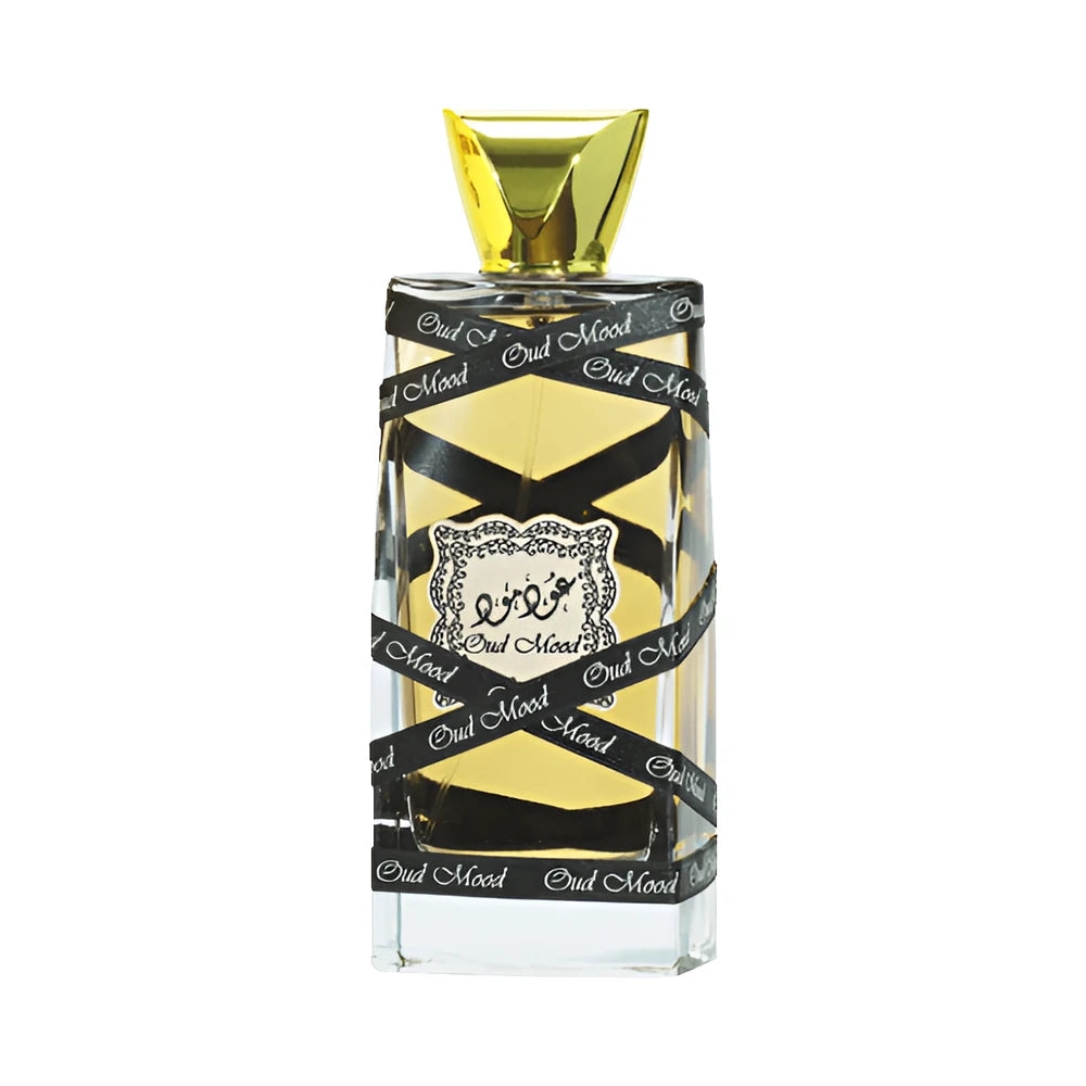 Oud Mood de Lattafa, perfume árabe ambarado amaderado especiado de carácter elegante, cálido y dulce