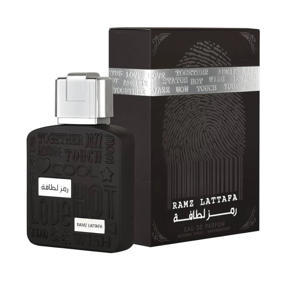 Ramz Lattafa Silver de Lattafa, fragancia ambarada vainilla con pera, lavanda y vainilla.