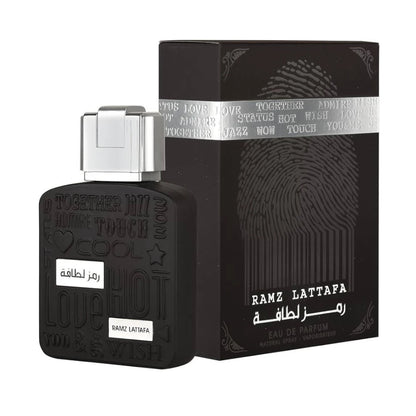 Ramz Lattafa Silver de Lattafa, fragancia ambarada vainilla con pera, lavanda y vainilla.
