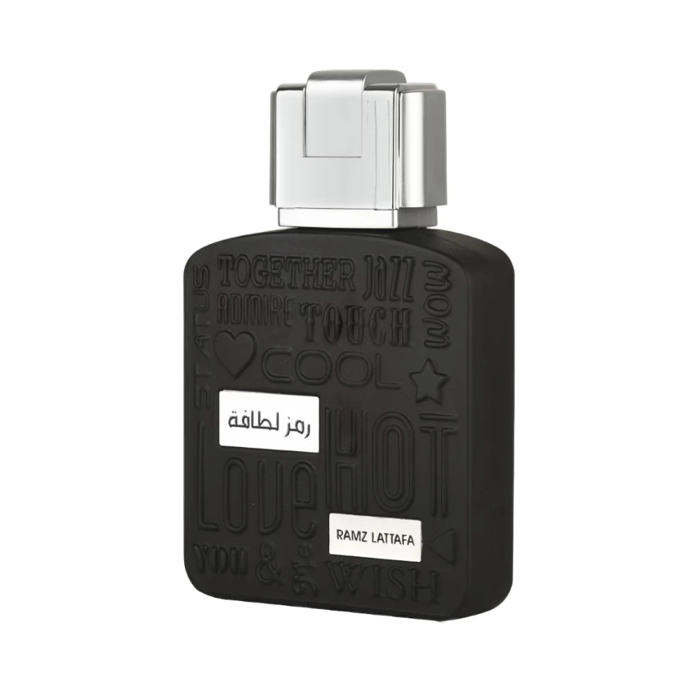 Ramz Lattafa Silver de Lattafa, fragancia ambarada vainilla con pera, lavanda y vainilla.