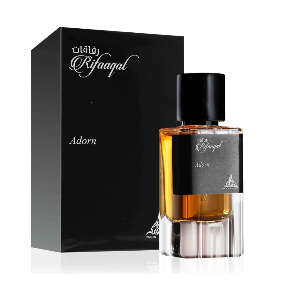 Rifaaqat Adorn de Paris Corner, fragancia amaderada especiada con mandarina, pachulí y vainilla.
